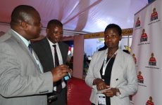 Postbank's Ag. Head of Strategy & Marketing, Mr. Vincent Makori (L), shares insights with the Principal Secretary of MSME Development, Hon. Susan Auma Mang'eni (R), during the Financial Inclusion Conference & Investor Expo 2024 at the Kenya School of Monetary Studies